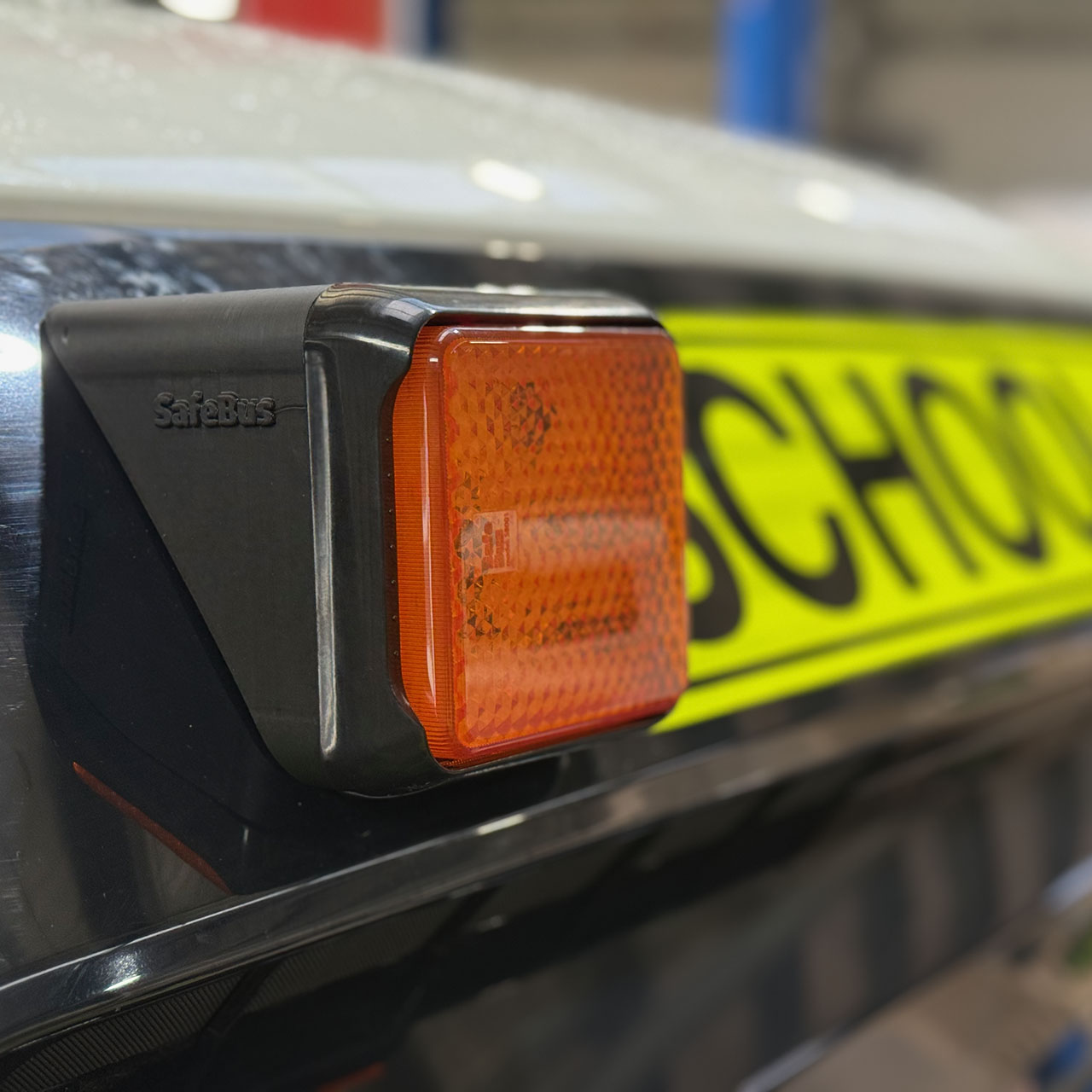 SafeBus lights fitted to a Toyota Coaster